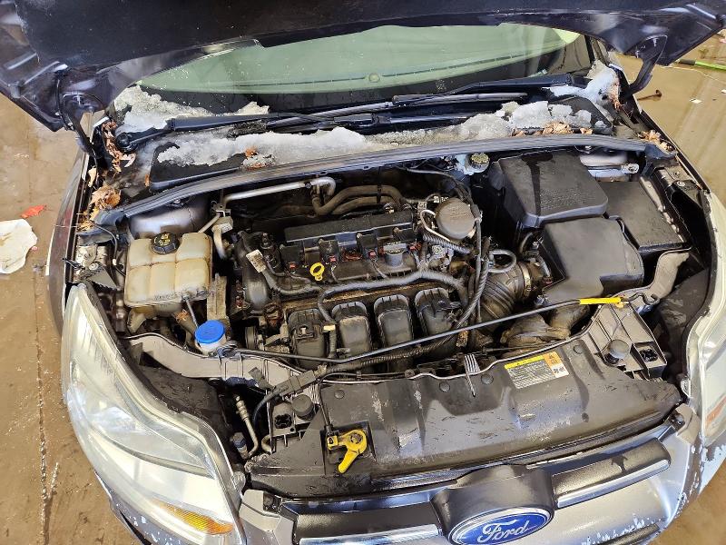 Фото 11 с аукциона – 2014 FORD FOCUS S с VIN 1FADP3E25EL131493
