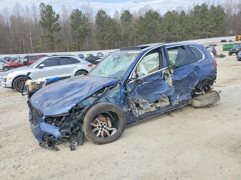 BMW X5 2021 with VIN 5UXCR6C02M9E23795 - Photo from auction