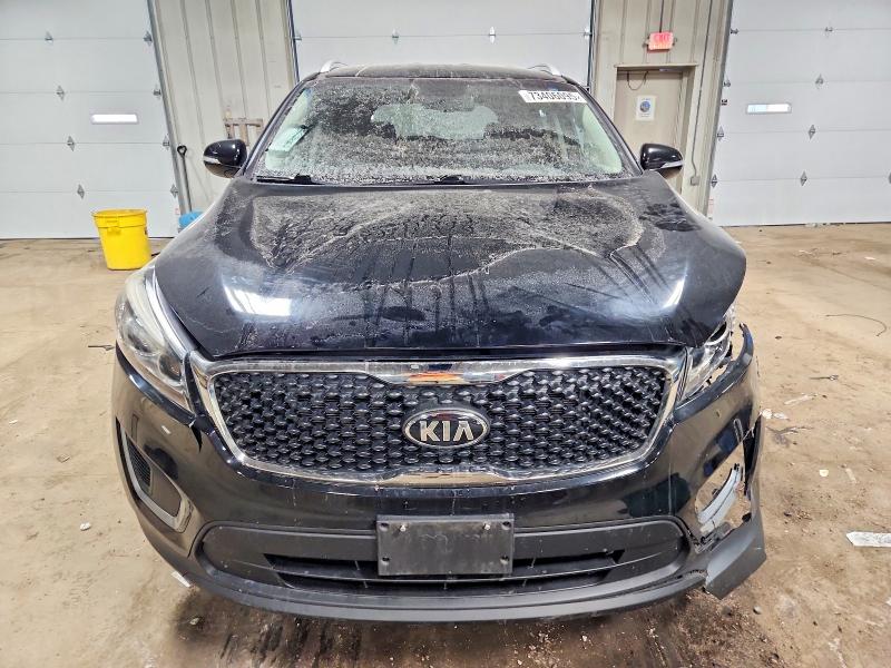 Photo 5 from auction – 2016 KIA SORENTO LX with VIN 5XYPG4A39GG058865
