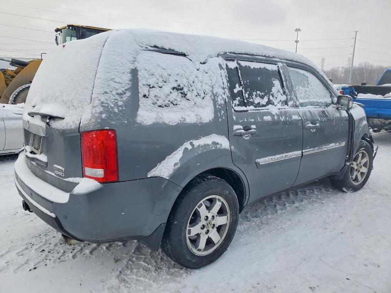 Photo 3 from auction – 2011 HONDA PILOT TOUR with VIN 5FNYF4H92BB070177