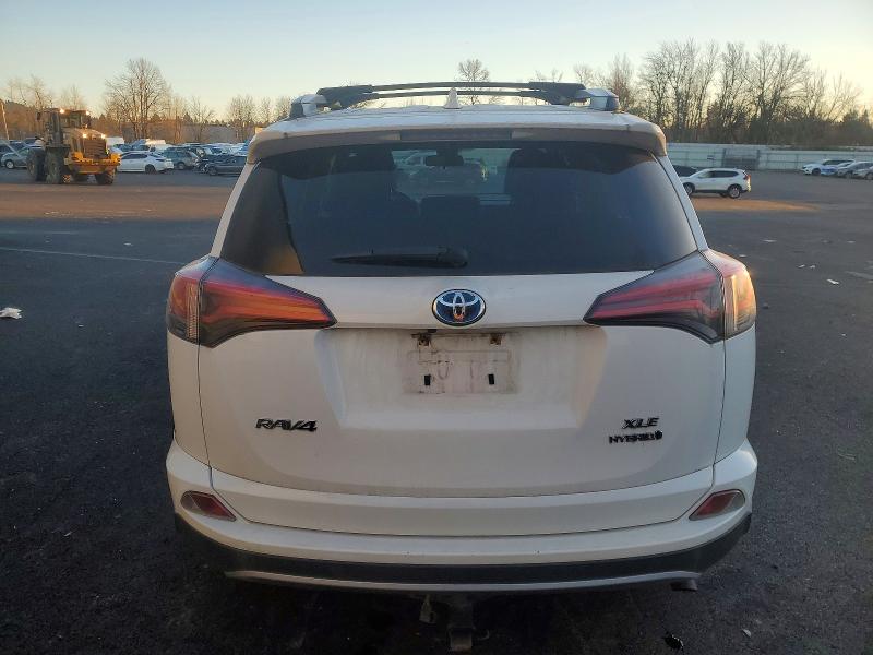 Photo 6 from auction – 2017 TOYOTA RAV4 HV LE with VIN JTMRJREVXHD098827