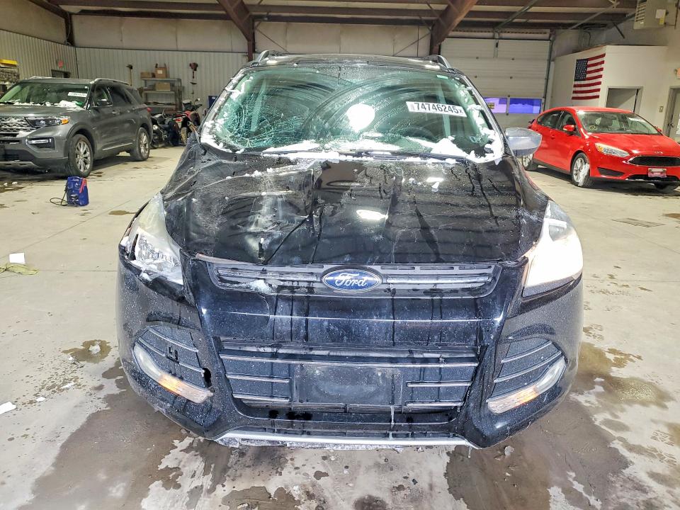 Photo 5 from auction – 2016 FORD ESCAPE with VIN 1FMCU9GX7GUA58534