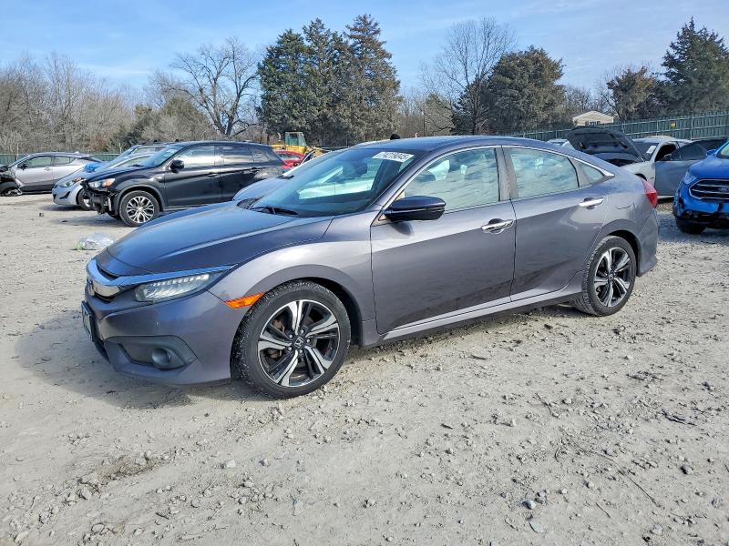 HONDA CIVIC 2016 with VIN 19XFC1F97GE200503 - Photo from auction