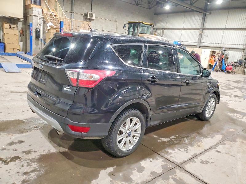 Photo 3 from auction – 2017 FORD ESCAPE SE with VIN 1FMCU9GD4HUA65495