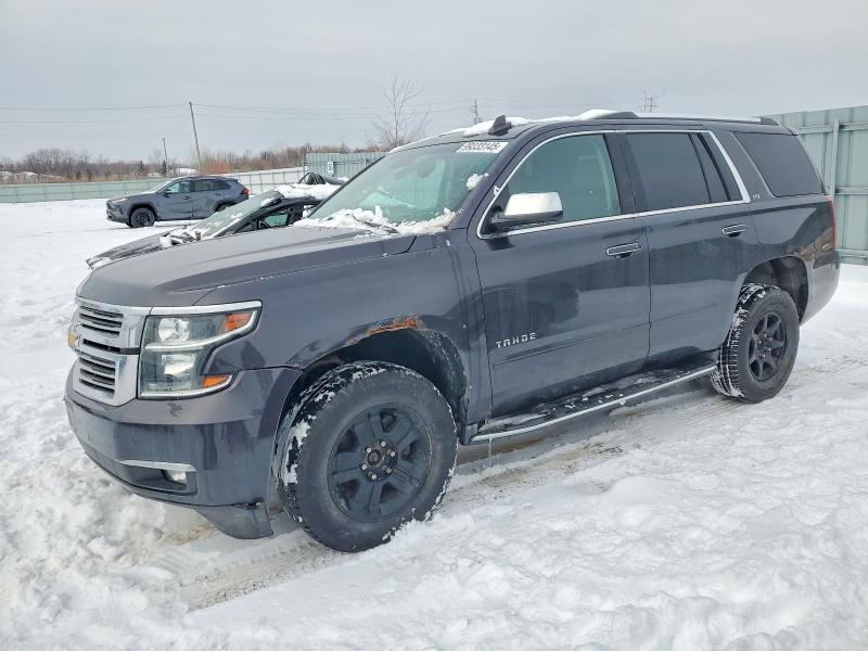 CHEVROLET TAHOE 2015 with VIN 1GNSKCKC0FR697242 - Photo from auction