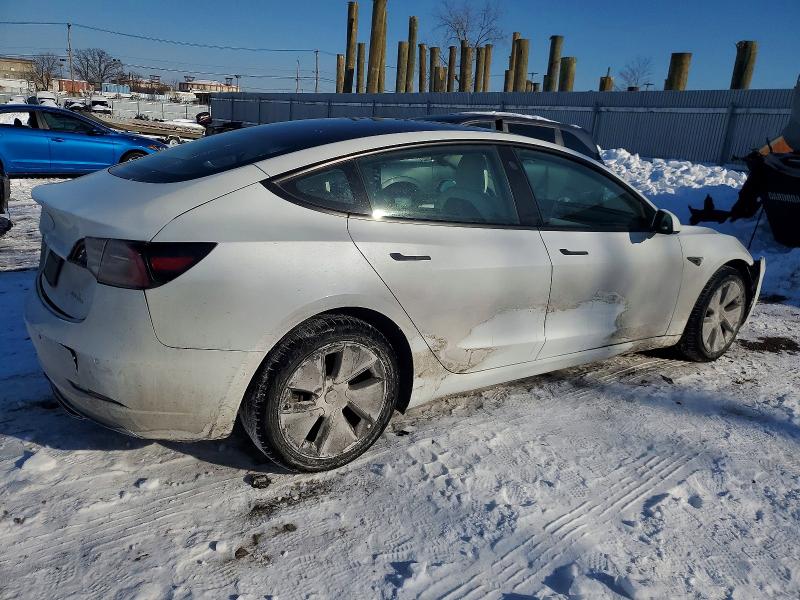 Photo 3 from auction – 2022 TESLA MODEL 3 with VIN 5YJ3E1EBXNF316142