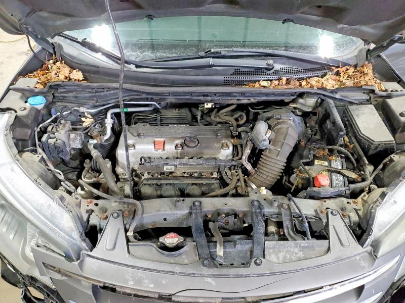 Photo 12 from auction – 2014 HONDA CR-V LX with VIN 2HKRM4H33EH717360