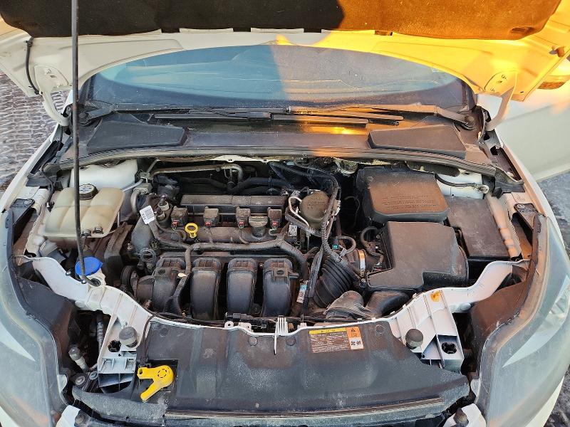 Photo 11 from auction – 2013 FORD FOCUS TITA with VIN 1FADP3J26DL227945
