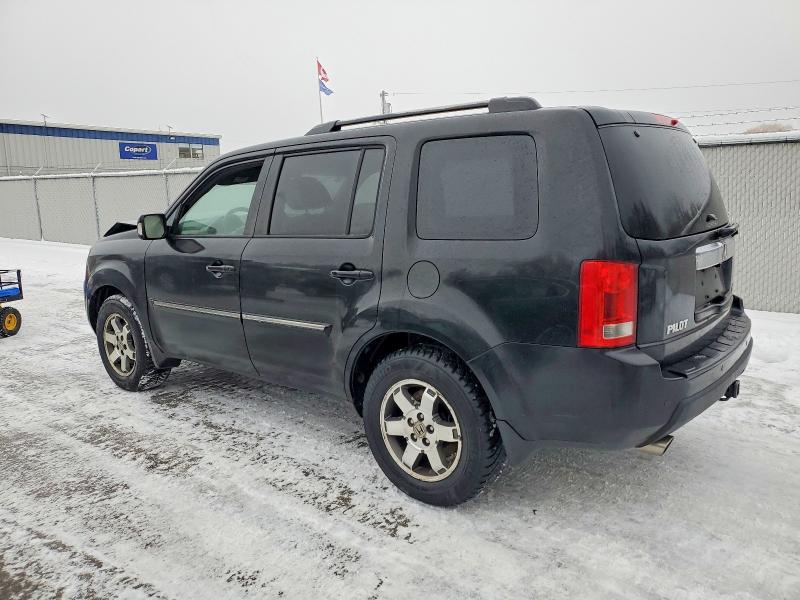 Photo 2 from auction – 2009 HONDA PILOT TOUR with VIN 5FNYF48869B012235