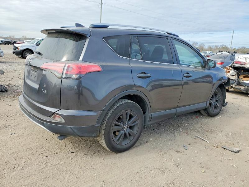 Photo 3 from auction – 2016 TOYOTA RAV4 with VIN JTMWFREVXGJ082714