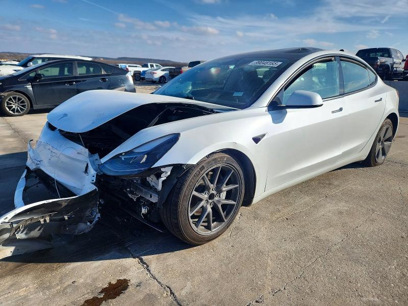 TESLA MODEL 3 2023 with VIN 5YJ3E1EA0PF556570 - Photo from auction
