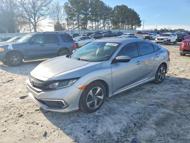 HONDA CIVIC LX 2021 with VIN 2HGFC2F63MH556217 - Photo from auction