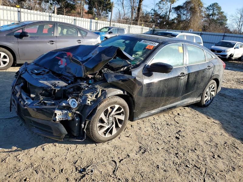 HONDA CIVIC EX 2018 с VIN 19XFC2F77JE033796 - Фото с аукциона