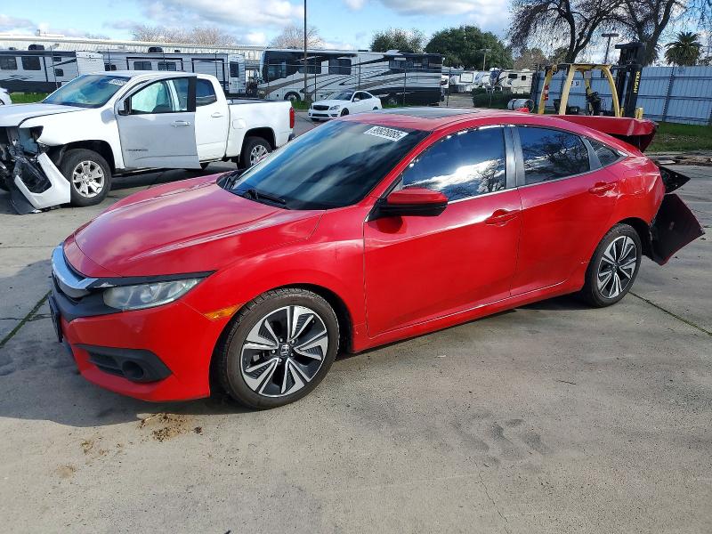 HONDA CIVIC EX 2017 with VIN 2HGFC1F35HH630226 - Photo from auction