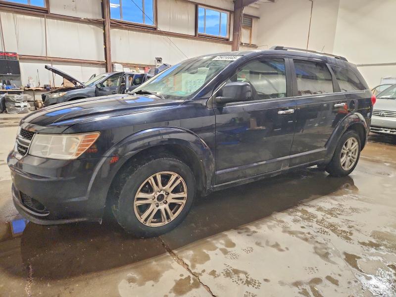 DODGE JOURNEY 2011 with VIN 3D4PH6FGXBT510671 - Photo from auction