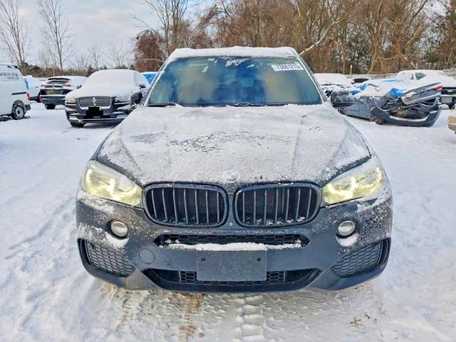 Photo 5 from auction – 2014 BMW X5 XDRIVE3 with VIN 5UXKR0C5XE0H22347