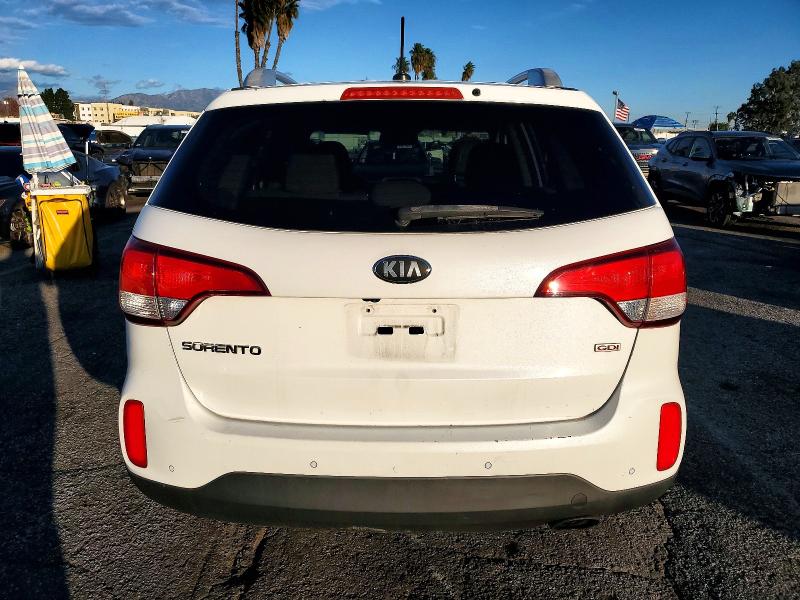 Photo 6 from auction – 2014 KIA SORENTO LX with VIN 5XYKT3A69EG504200