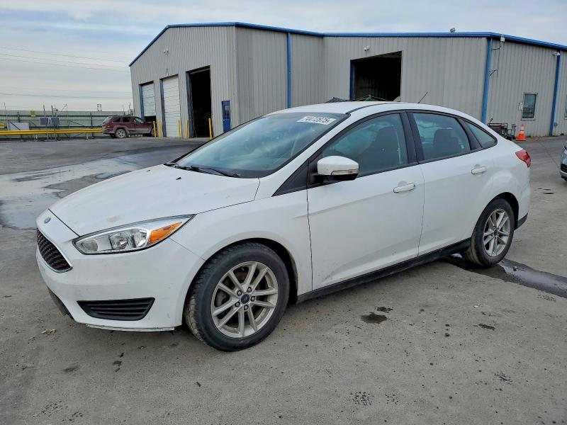 FORD FOCUS SE 2017 with VIN 1FADP3F27HL251069 - Photo from auction