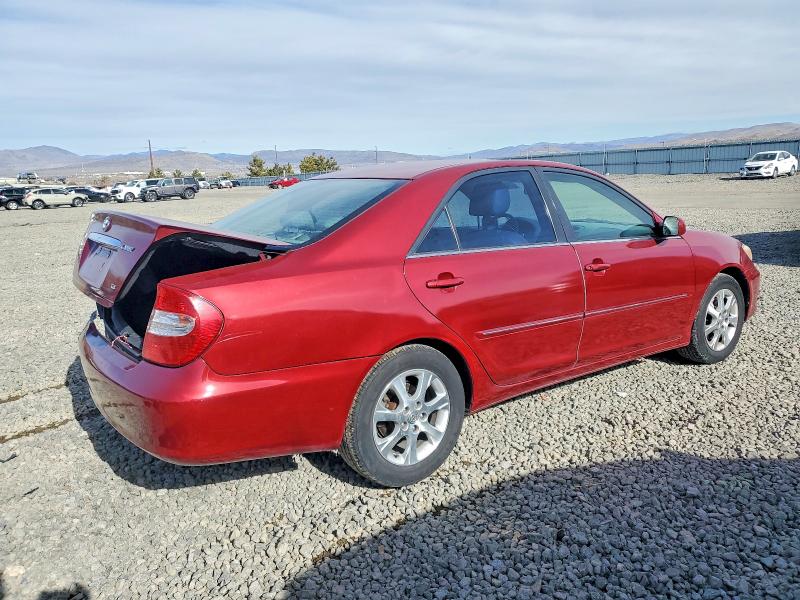Photo 3 from auction – 2002 TOYOTA CAMRY LE with VIN JTDBF30K920050036