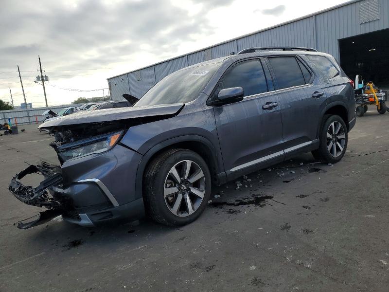 HONDA PILOT ELIT 2023 with VIN 5FNYG1H82PB012449 - Photo from auction