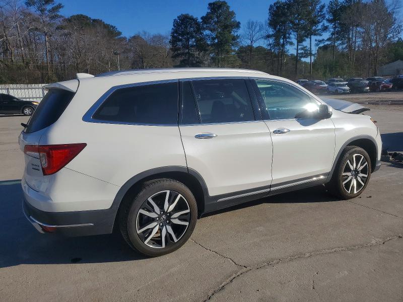 Photo 3 from auction – 2022 HONDA PILOT TOUR with VIN 5FNYF5H66NB004554