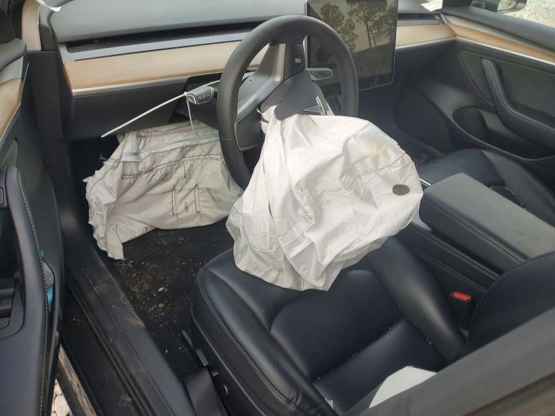 Photo 8 from auction – 2022 TESLA MODEL 3 with VIN 5YJ3E1EB3NF249321