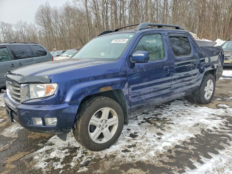 HONDA RIDGELINE 2014 with VIN 5FPYK1F52EB002323 - Photo from auction