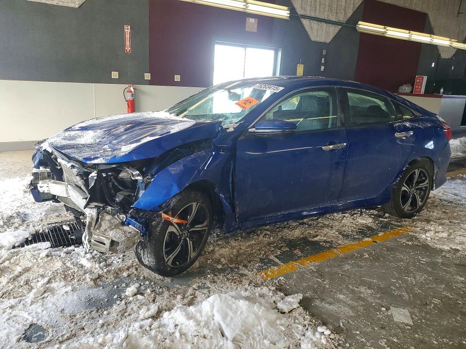 HONDA CIVIC 2016 with VIN 19XFC1F96GE002303 - Photo from auction
