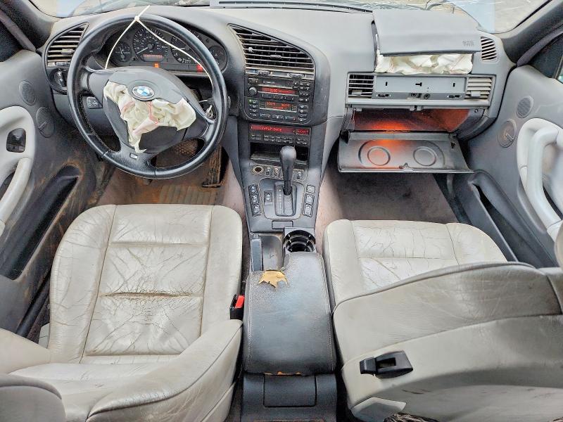 Photo 8 from auction – 1999 BMW 323 IC AUT with VIN WBABJ8334XEM25936