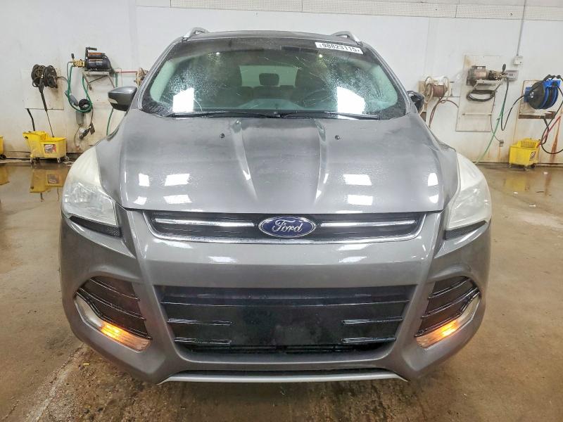 Photo 5 from auction – 2014 FORD ESCAPE TIT with VIN 1FMCU0JXXEUD84412
