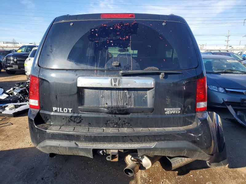 Photo 6 from auction – 2014 HONDA PILOT TOUR with VIN 5FNYF4H9XEB039828