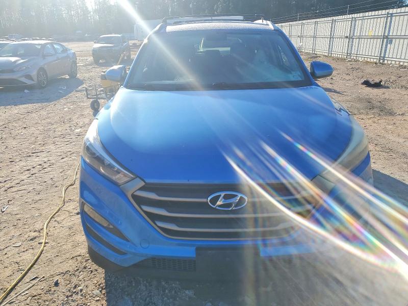 Photo 5 from auction – 2016 HYUNDAI TUCSON LIM with VIN KM8J33A46GU198239