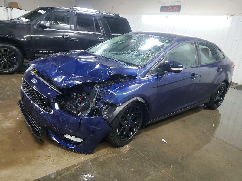 FORD FOCUS SE 2016 with VIN 1FADP3F2XGL275042 - Photo from auction