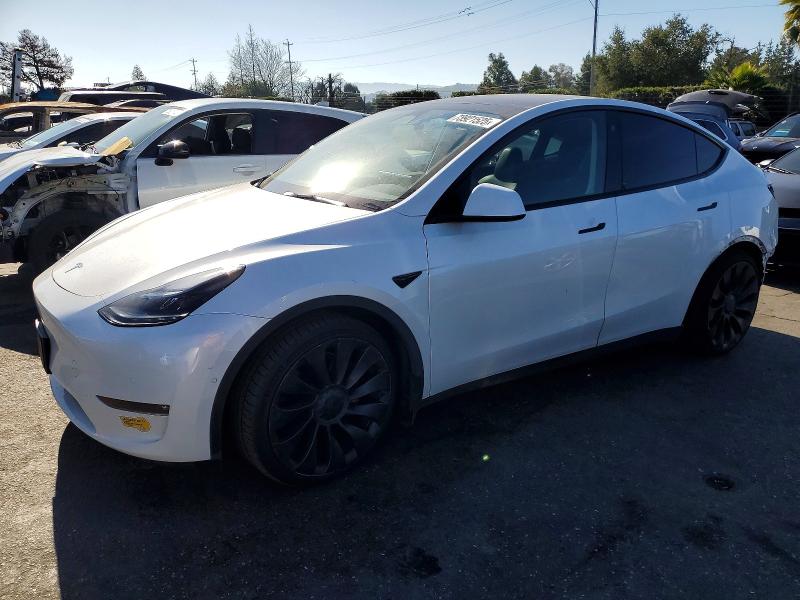 TESLA MODEL Y 2022 with VIN 7SAYGDEF1NF494125 - Photo from auction