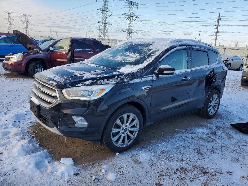 FORD ESCAPE TIT 2017 with VIN 1FMCU9JD9HUE96195 - Photo from auction