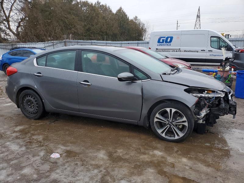 Photo 4 from auction – 2014 KIA FORTE with VIN KNAFZ4A8XE5077090