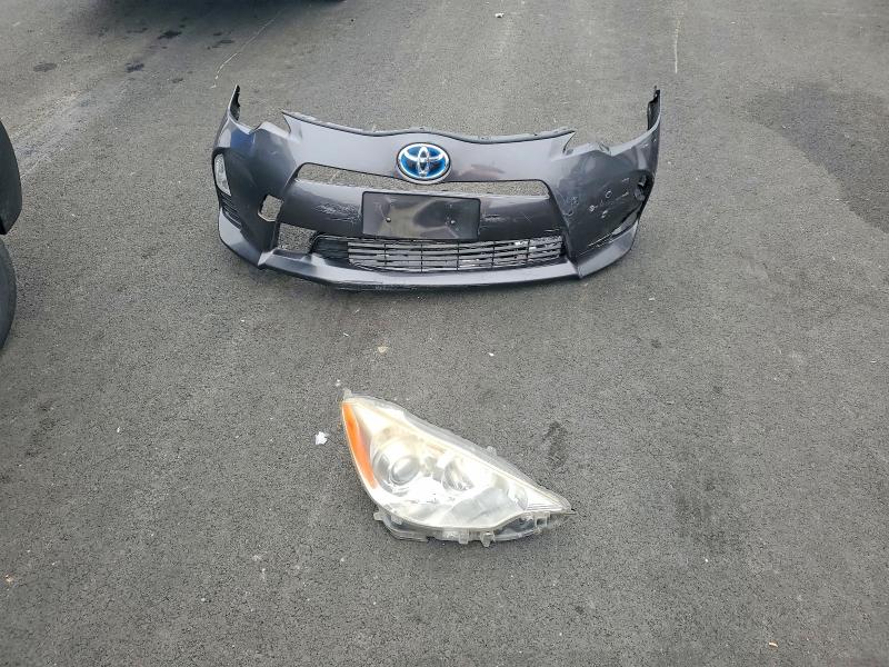 Photo 12 from auction – 2014 TOYOTA PRIUS C with VIN JTDKDTB34E1066767