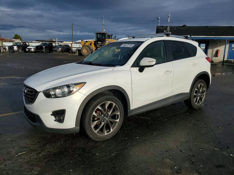 MAZDA CX-5 GT 2016 with VIN JM3KE4DY6G0730353 - Photo from auction