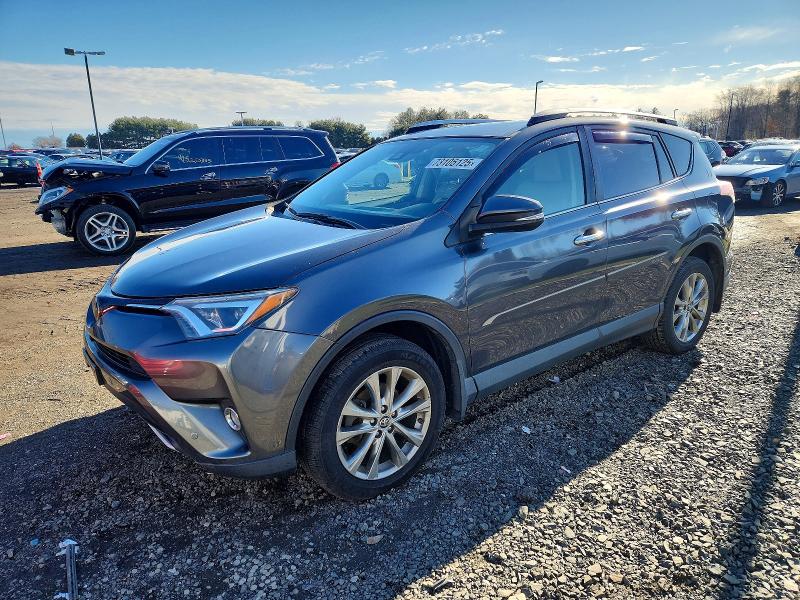 TOYOTA RAV4 LIMIT 2016 with VIN JTMDFREV7GJ057003 - Photo from auction