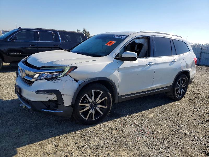 HONDA PILOT 2019 with VIN 5FNYF5H9XKB000643 - Photo from auction