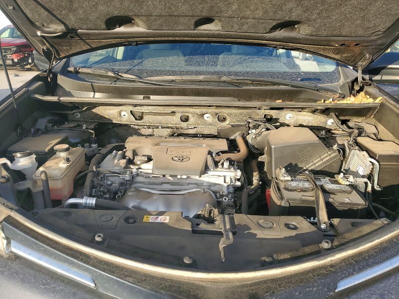 Photo 11 from auction – 2018 TOYOTA RAV4 LE with VIN JTMZFREV6JJ211147