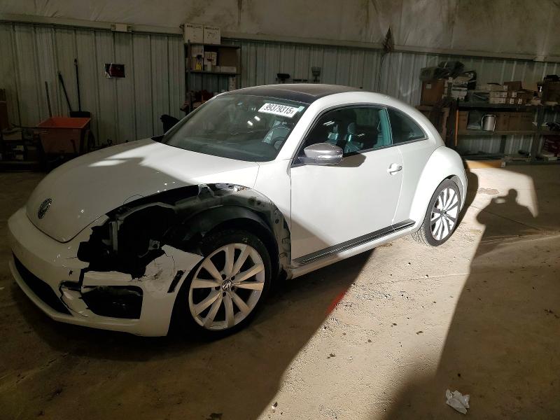 VOLKSWAGEN BEETLE 2014 with VIN 3VWJ17AT7EM655261 - Photo from auction