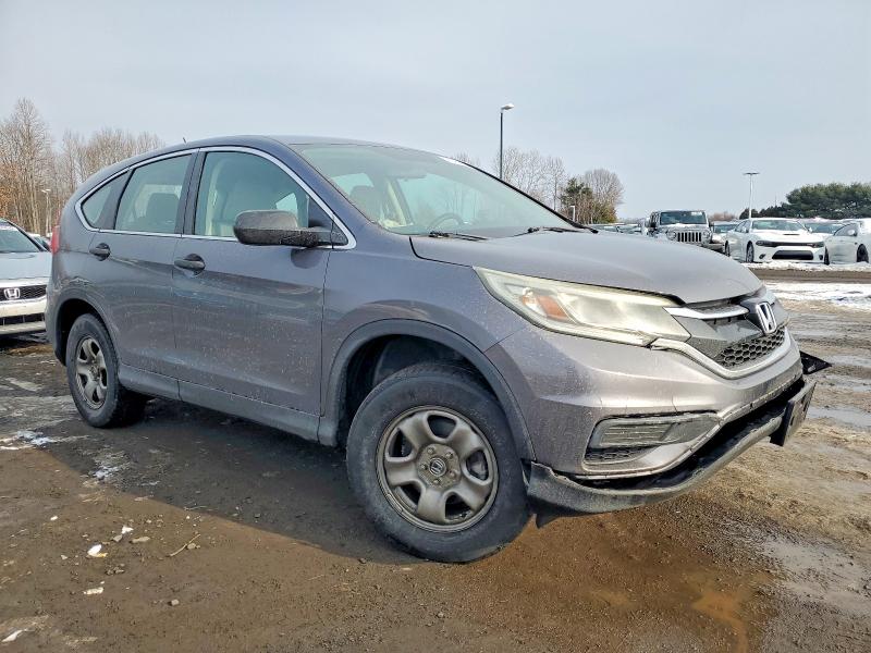 Photo 4 from auction – 2015 HONDA CR-V LX with VIN 5J6RM4H34FL037622