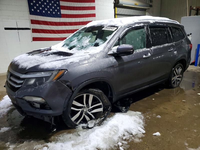 HONDA PILOT TOUR 2017 with VIN 5FNYF6H98HB075081 - Photo from auction