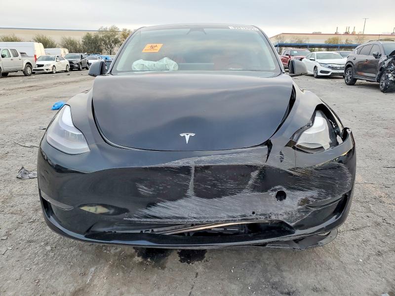 Photo 5 from auction – 2022 TESLA MODEL Y with VIN 7SAYGDEF5NF572826