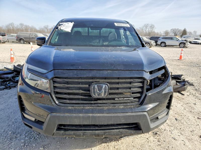 Photo 5 from auction – 2023 HONDA RIDGELINE with VIN 5FPYK3F88PB017790