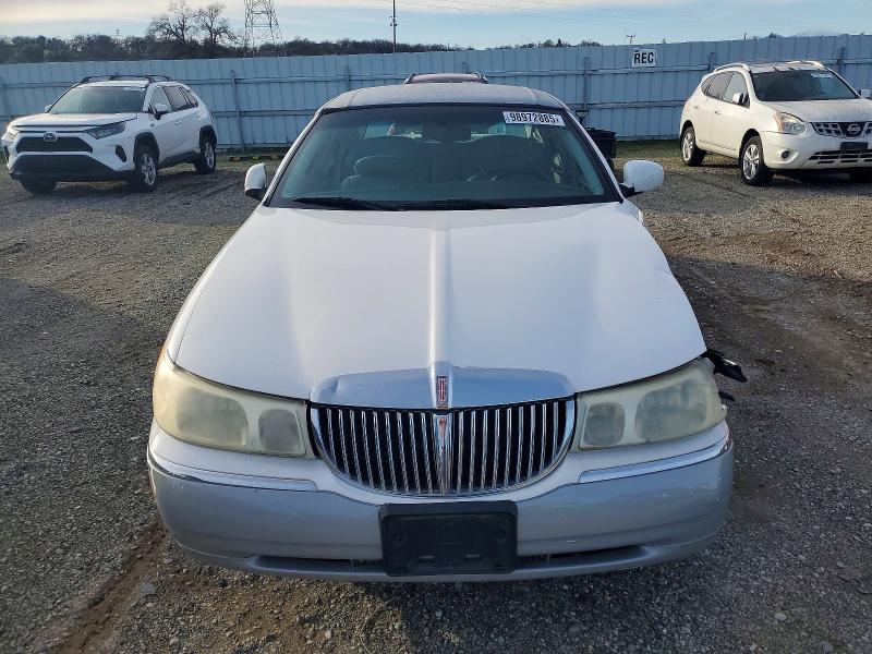 Photo 5 from auction – 2001 LINCOLN TOWN CAR E with VIN 1LNHM81W11Y659356