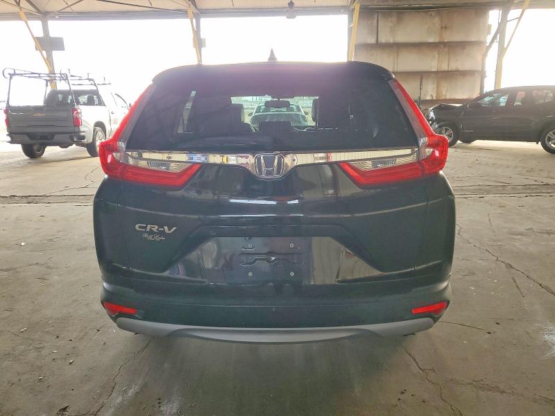 Photo 6 from auction – 2017 HONDA CR-V with VIN 7FARW1H8XHE038682