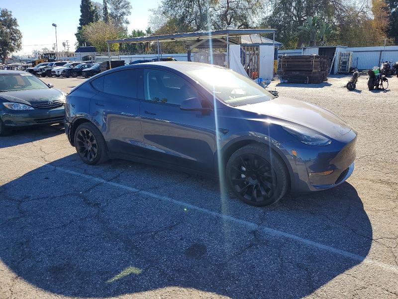 Photo 4 from auction – 2023 TESLA MODEL Y with VIN 7SAYGDED3PF962504