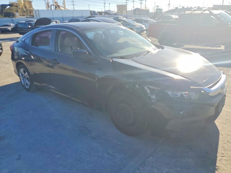Photo 4 from auction – 2016 HONDA CIVIC LX with VIN 2HGFC2F52GH512236